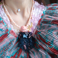 ANIGIG ANTIQUE DOLL NECKLACE