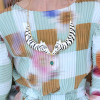 SOFIO GONGLI ZEBRA NECKLACE