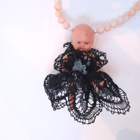 ANIGIG ANTIQUE DOLL NECKLACE