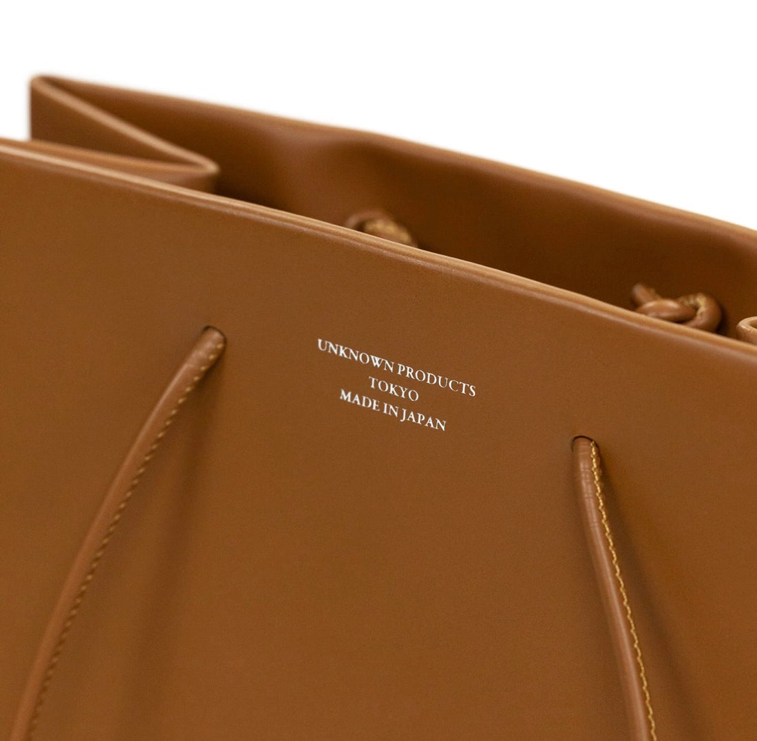 UNKNOWN PRODUCTS  LEATHER PAPER BAG