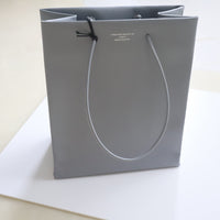 UNKNOWN PRODUCTS  LEATHER PAPER BAG