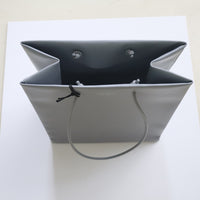 UNKNOWN PRODUCTS  LEATHER PAPER BAG