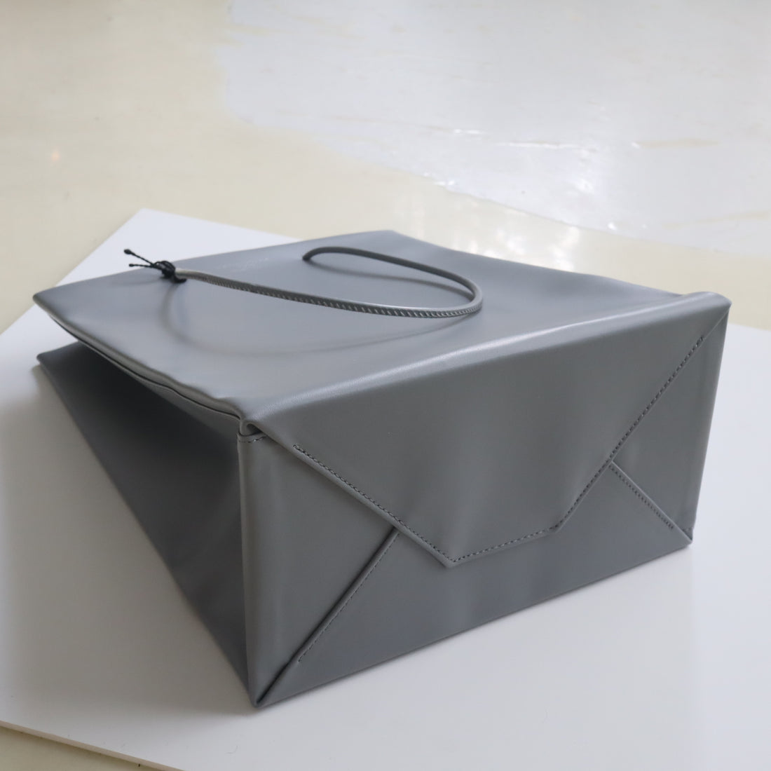 UNKNOWN PRODUCTS  LEATHER PAPER BAG