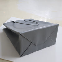 UNKNOWN PRODUCTS  LEATHER PAPER BAG