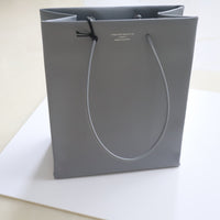 UNKNOWN PRODUCTS  LEATHER PAPER BAG