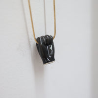 ANDRESGALLARDO  FIST PENDANT