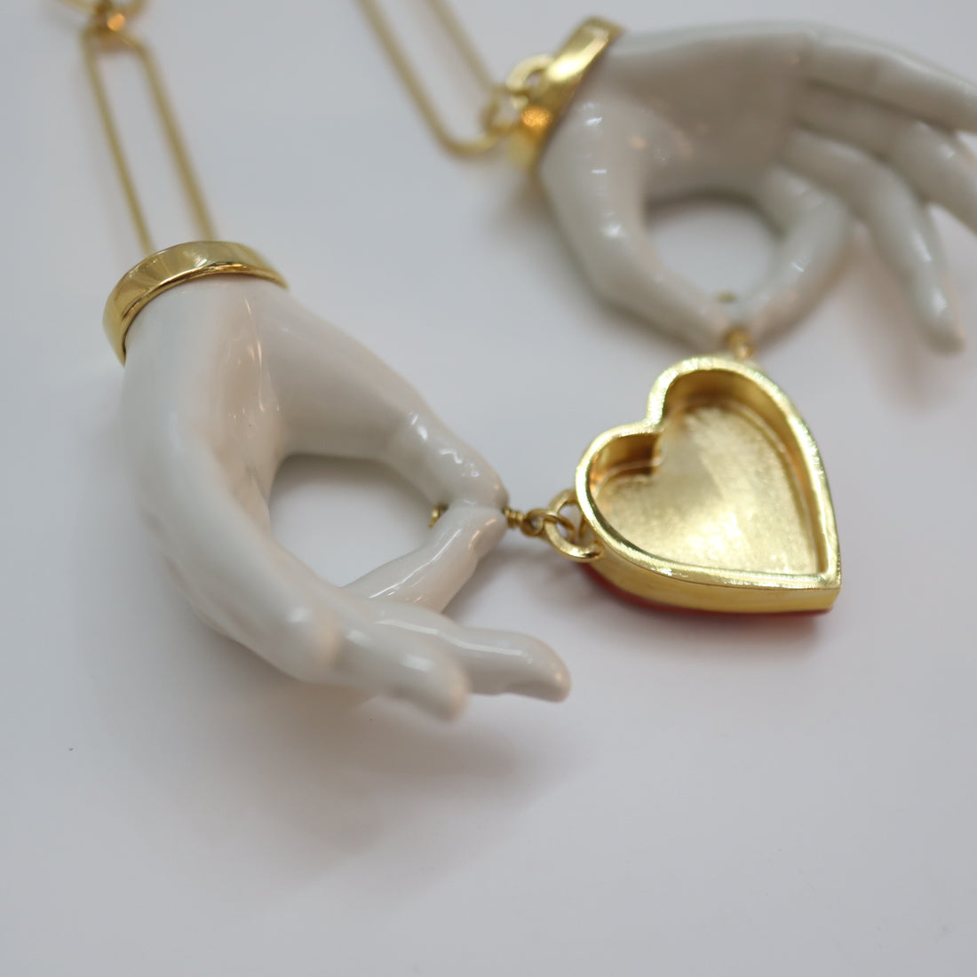ANDRESGALLARDO  HEART COUPLE HANDS NECKLACE