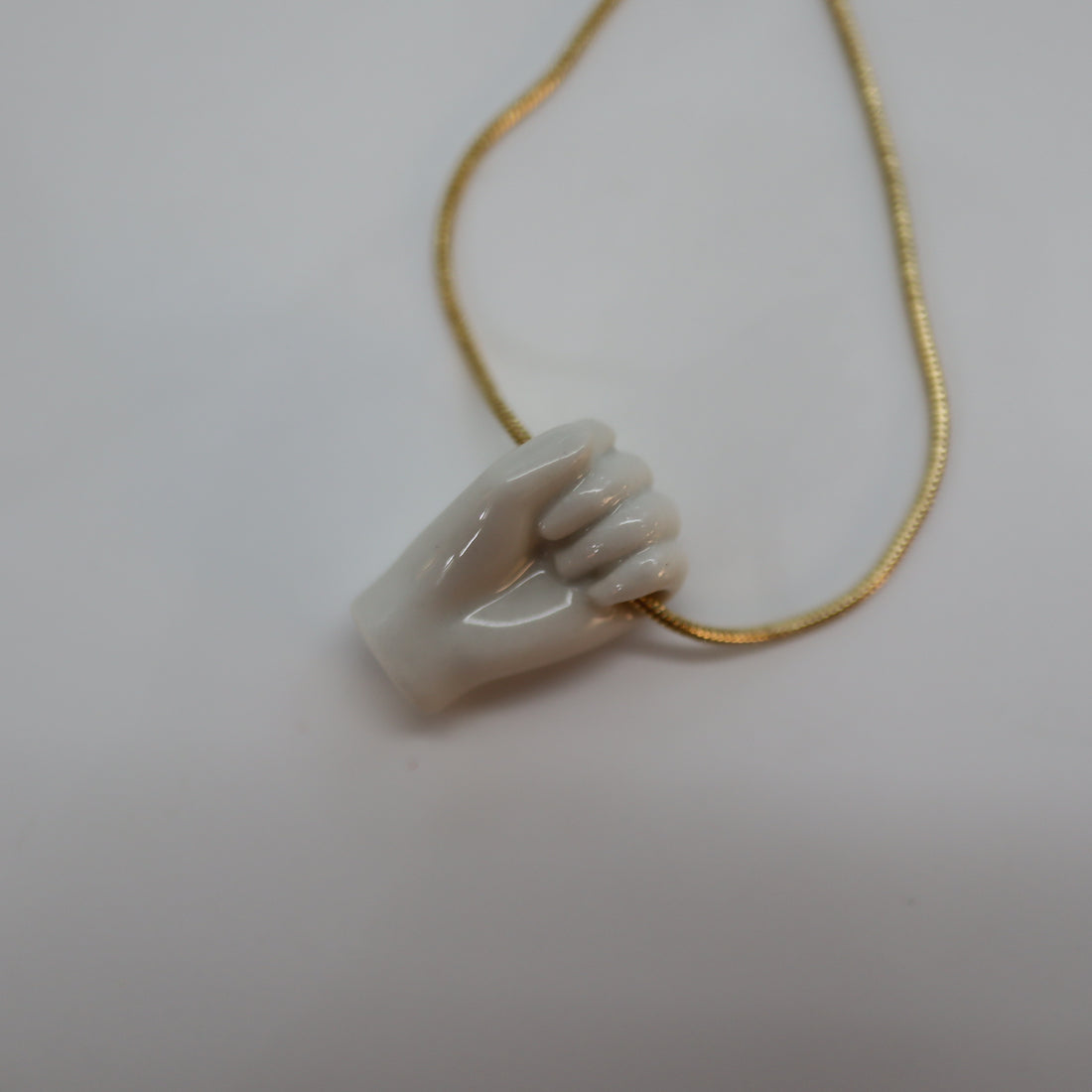 ANDRESGALLARDO  FIST PENDANT