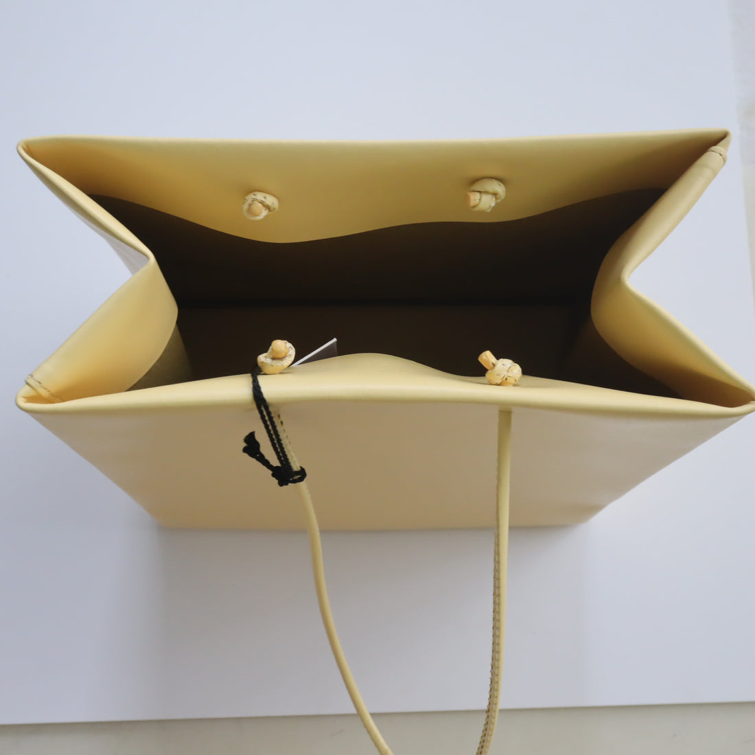 UNKNOWN PRODUCTS  LEATHER PAPER BAG