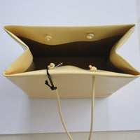 UNKNOWN PRODUCTS  LEATHER PAPER BAG