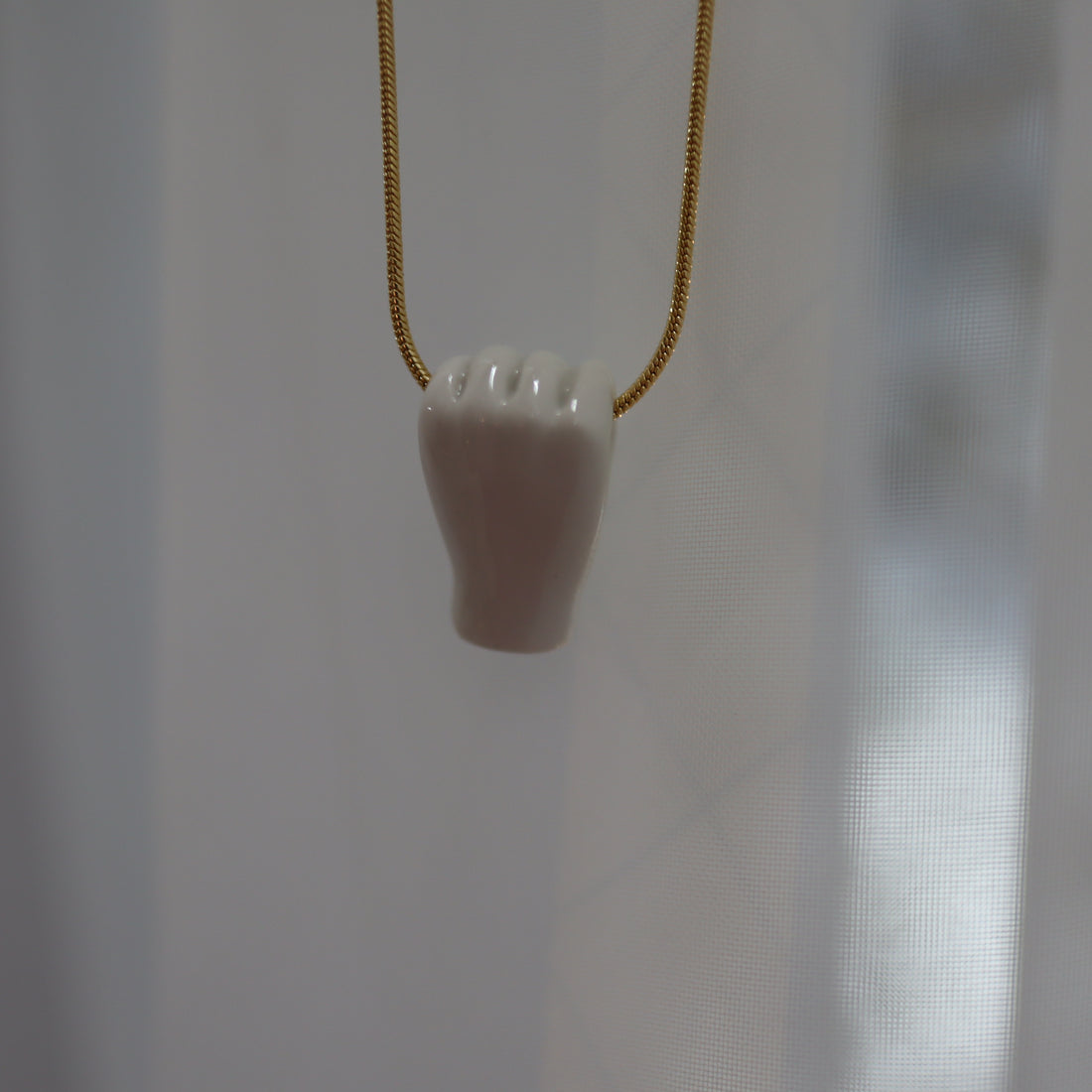 ANDRESGALLARDO  FIST PENDANT