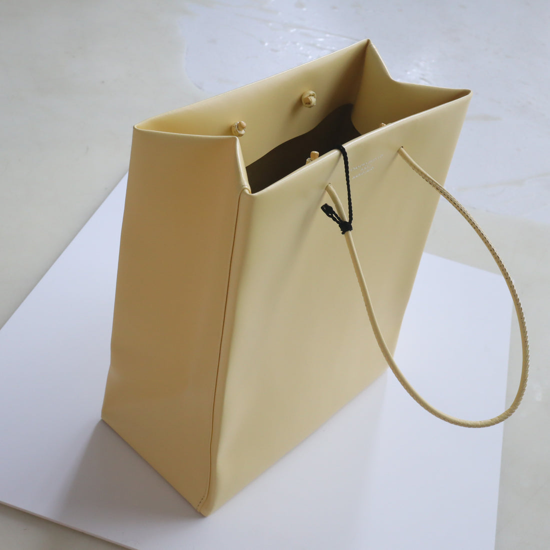 UNKNOWN PRODUCTS  LEATHER PAPER BAG