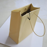 UNKNOWN PRODUCTS  LEATHER PAPER BAG