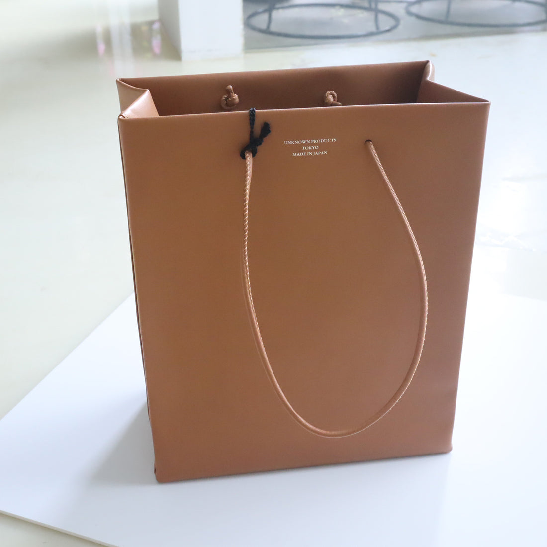 UNKNOWN PRODUCTS  LEATHER PAPER BAG