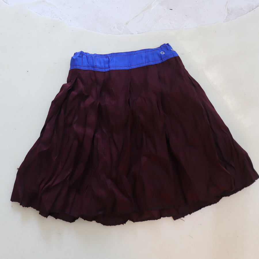 NONG RAKWRAP SNAP PLEATED CONTRAST SKIRT