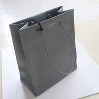 UNKNOWN PRODUCTS  LEATHER PAPER BAG