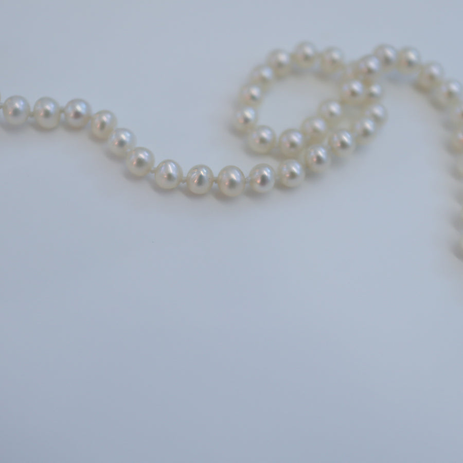 GERALDINE FENNSILVER ON PEARLS NECKLACE