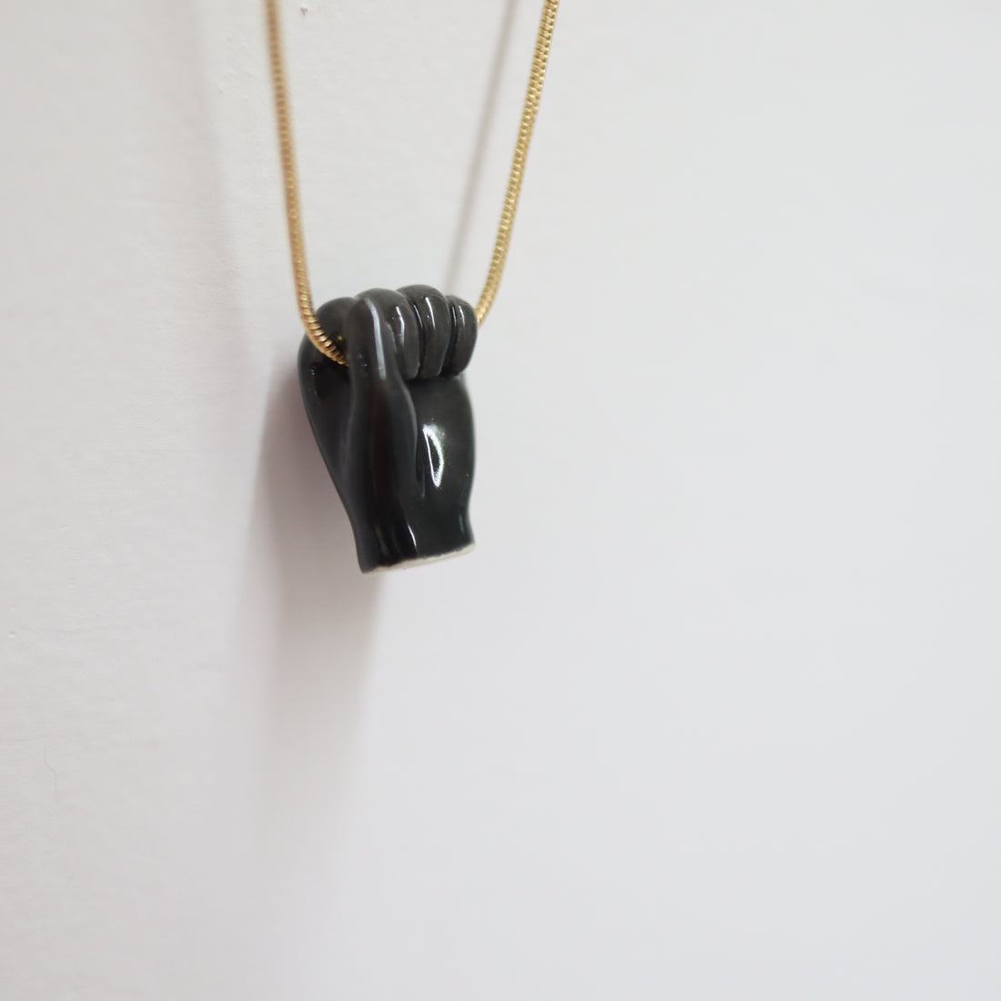 ANDRESGALLARDO  FIST PENDANT