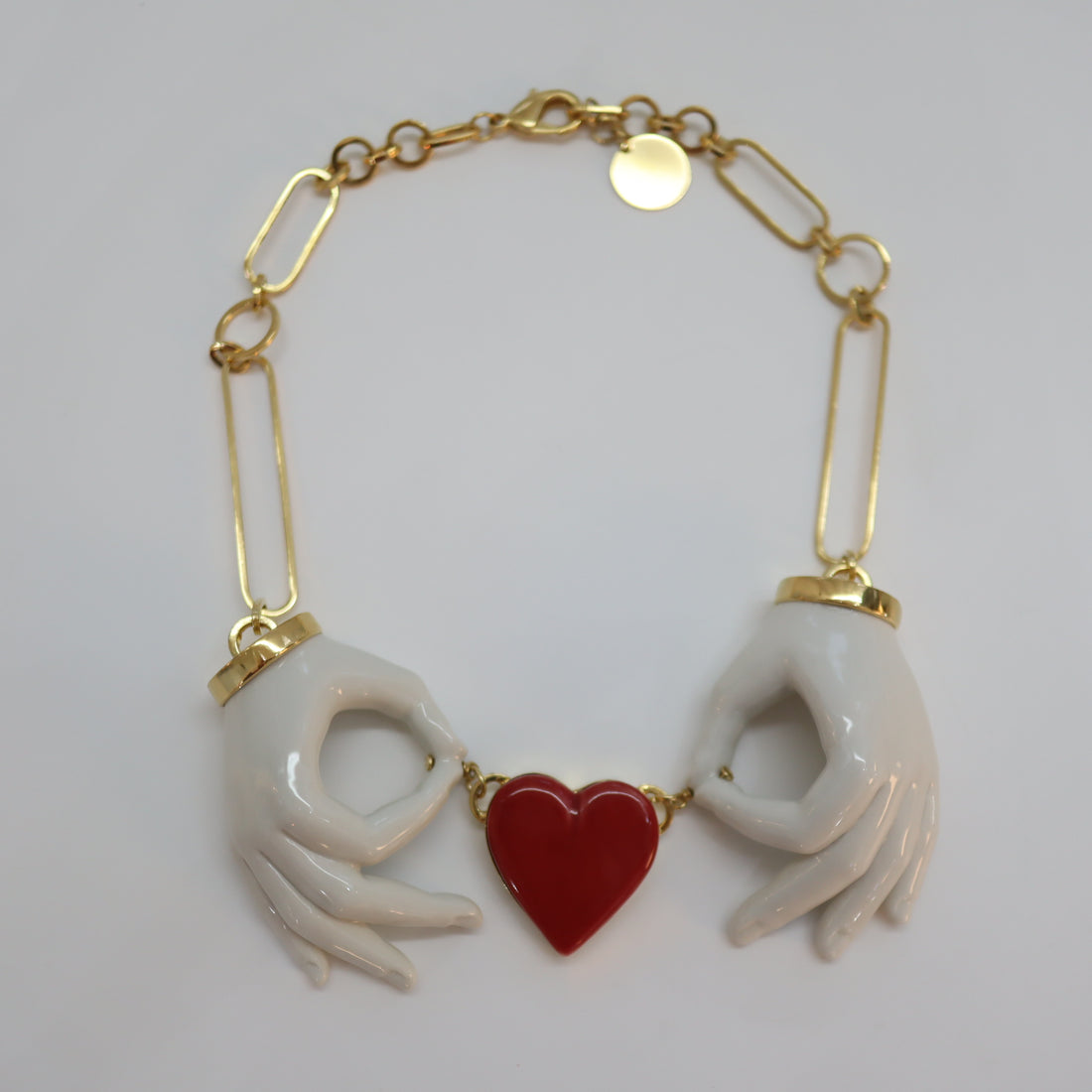 ANDRESGALLARDO  HEART COUPLE HANDS NECKLACE