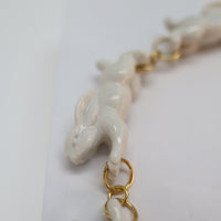 ANDRESGALLARDO  RUNNING RABBIT NECKLACE