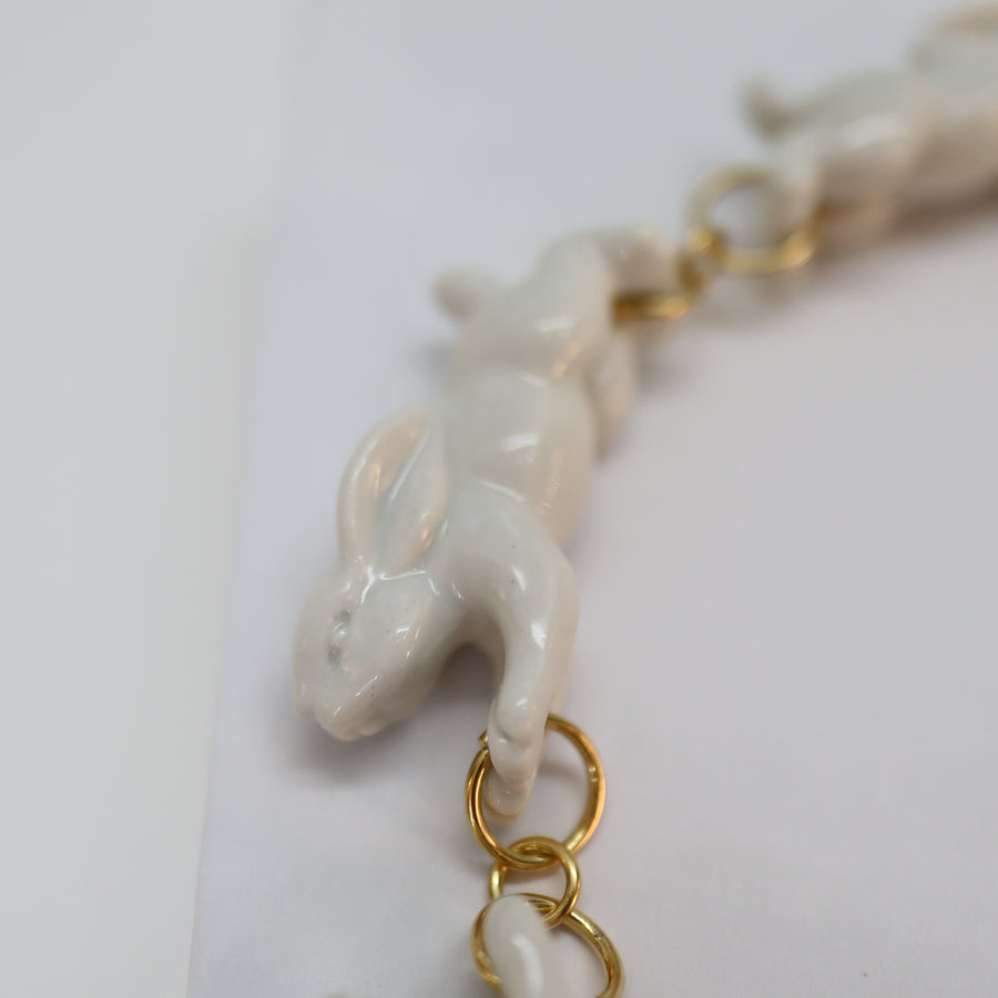 ANDRESGALLARDORUNNING RABBIT NECKLACE