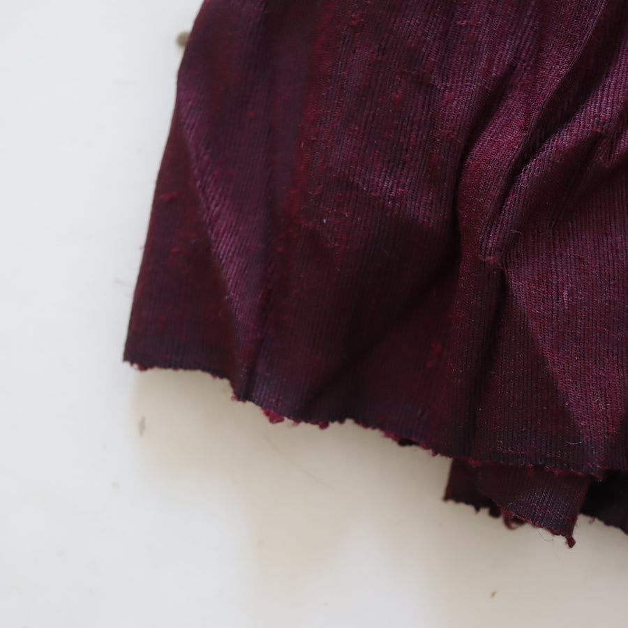 NONG RAKWRAP SNAP PLEATED CONTRAST SKIRT