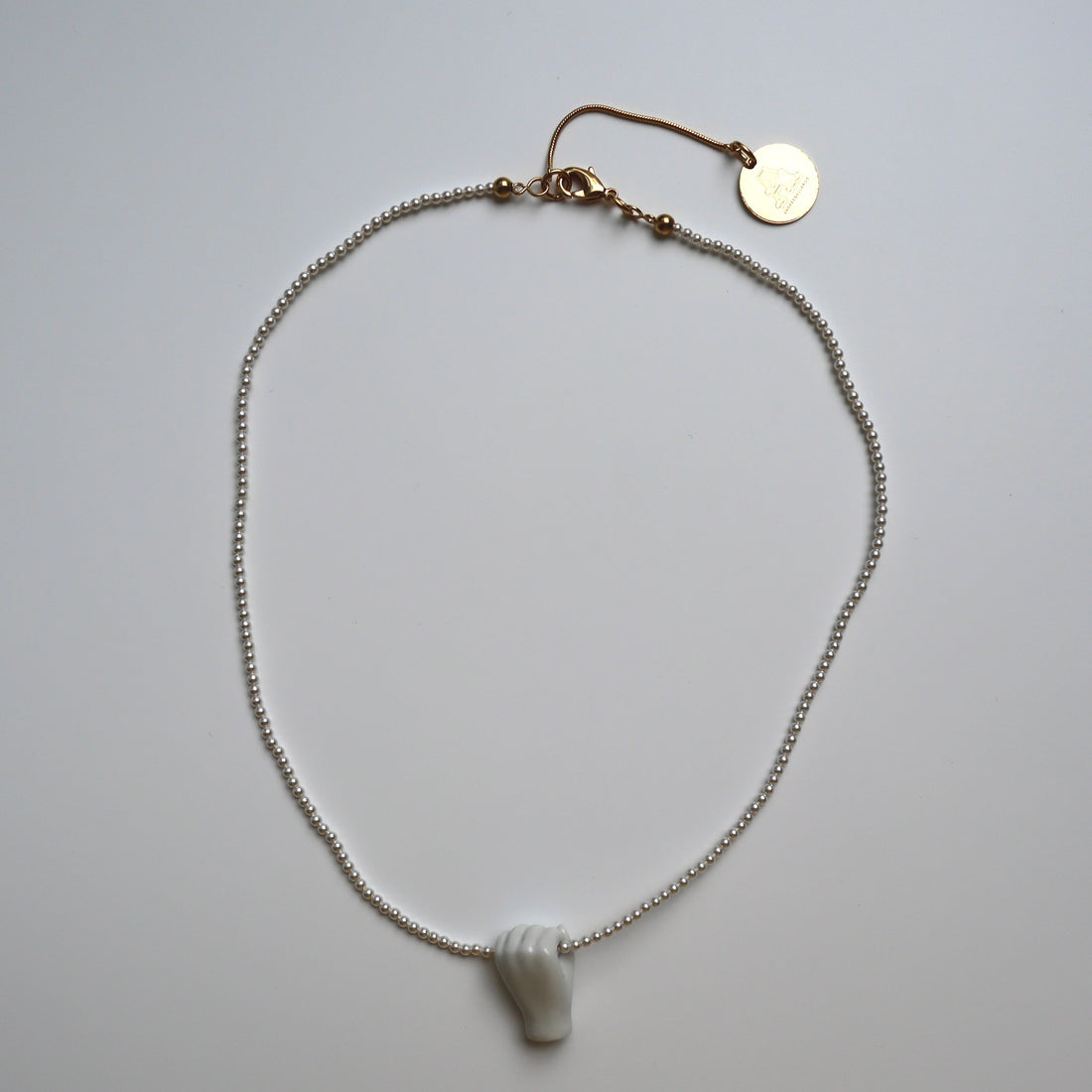 ANDRESGALLARDO  FIST&PEARLS NECKLACE