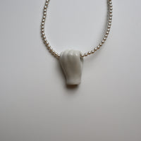 ANDRESGALLARDO  FIST&PEARLS NECKLACE