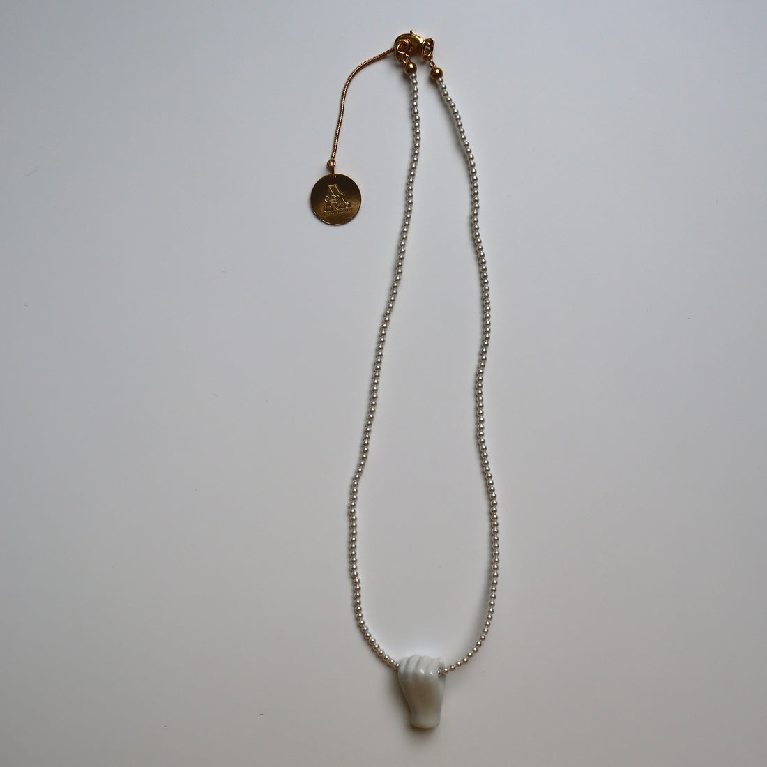 ANDRESGALLARDO  FIST&PEARLS NECKLACE