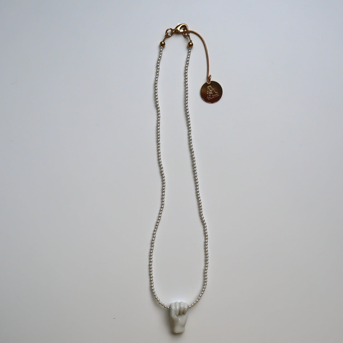 ANDRESGALLARDO  FIST&PEARLS NECKLACE