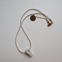 ANDRESGALLARDO  FIST&PEARLS NECKLACE