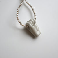 ANDRESGALLARDO  FIST&PEARLS NECKLACE
