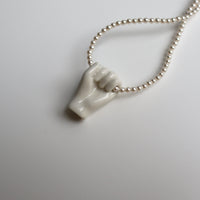 ANDRESGALLARDO  FIST&PEARLS NECKLACE
