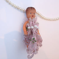 ANIGIG  ANTIQUE DOLL NECKLACE
