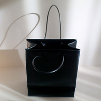 UNKNOWN PRODUCTS LEATHER PAPER BAG