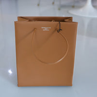UNKNOWN PRODUCTS  LEATHER PAPER BAG